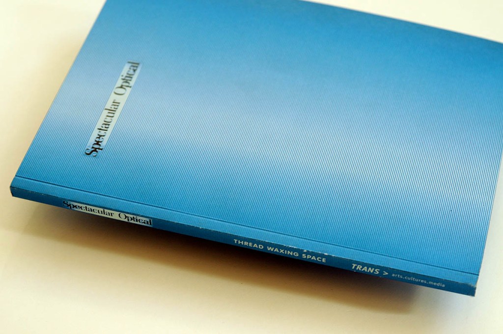 spectacular optical cover